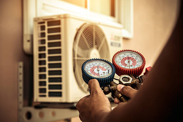 Professional Hvac Installation technician working in Island Park, NY